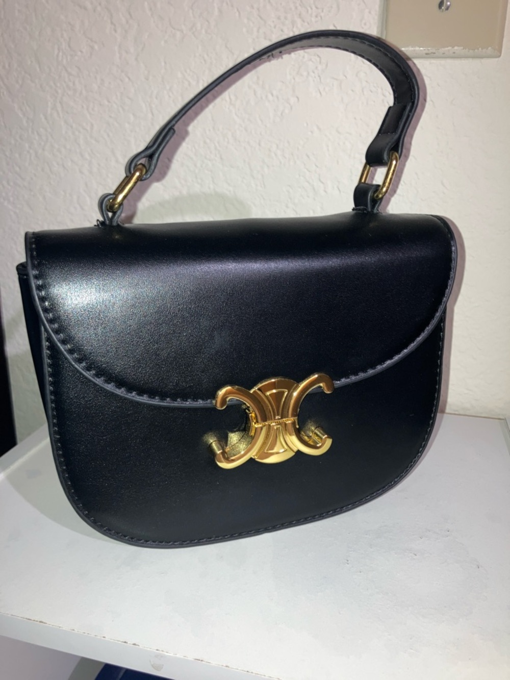 Black Leather Top-Handle Shoulder Bag with Gold Accent